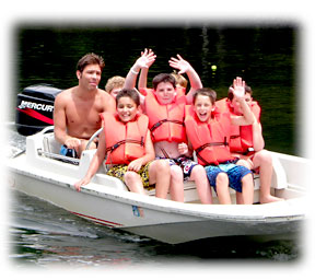 Staff and Campers on the lake